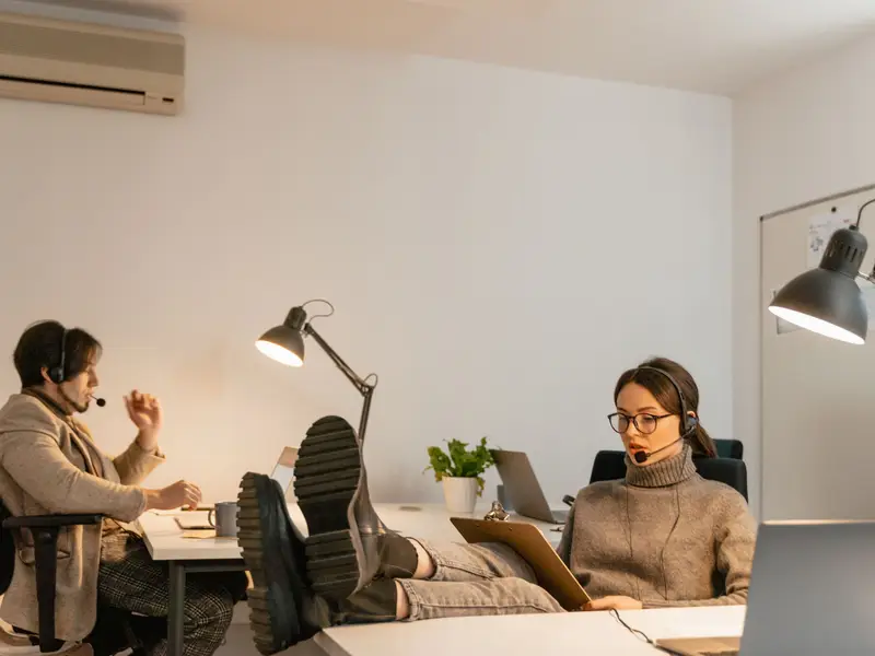 Office team at a desk answering calls